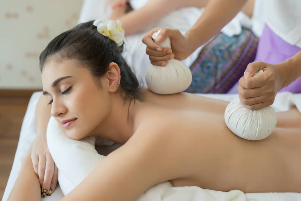 Client relaxing during a massage session